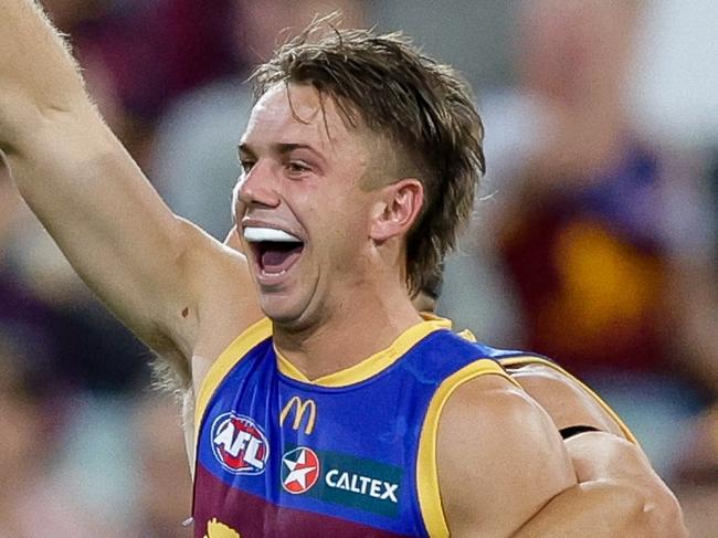 BRISBANE, AUSTRALIA - MAY 05: Harry Sharp of the Lions celebrates a goal during the 2024 AFL Round 08 match between the Brisbane Lions and the Gold Coast SUNS at The Gabba on May 05, 2024 in Brisbane, Australia. (Photo by Russell Freeman/AFL Photos via Getty Images)