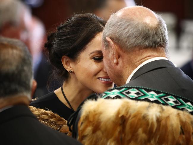 Meghan, Duchess of Sussex receives a “hongi”, or traditional Maori greeting on a visit to Te Papaiouru marae in Rotorua. Picture: AFP