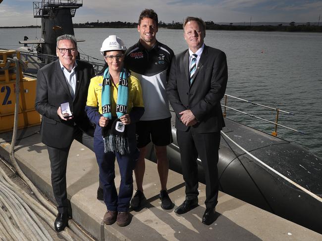 18/04/18 - AFL - Port Adelaide at ASC - RSL branch manager Kim Henshaw, Emily Dodd 26yrs apprentice Fabricator, Travis Boak and CEO Keith Thomas. Picture SARAH REED