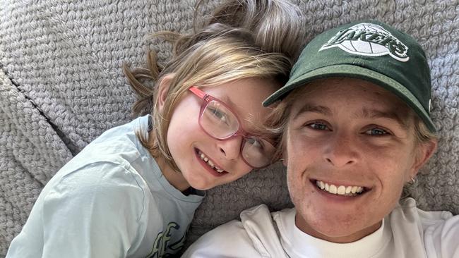 Georgia Batten, 28, who was diagnosed with thyroid cancer, with her eight year old daughter Jazmin. Picture: Supplied