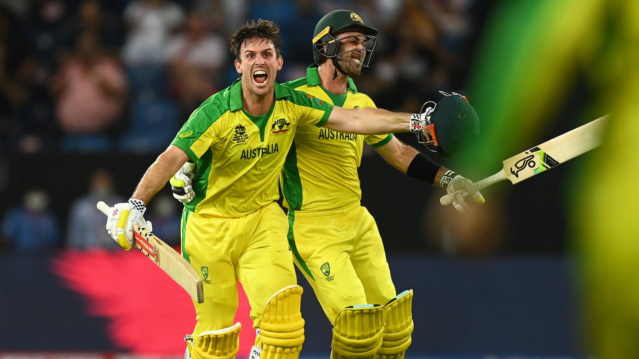 Mitchell Marsh celebrates with Glenn Maxwell after hitting the winning runs. Photo by Gareth Copley-ICC/ICC via Getty Images