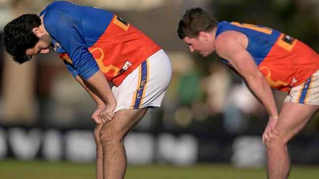 EFNL: The despair of defeat for Mulgrave players. Picture: Andy Brownbill