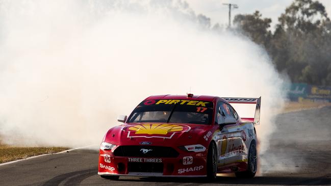 Scott McLaughlin celebrates the win with a burnout. Picture: Getty