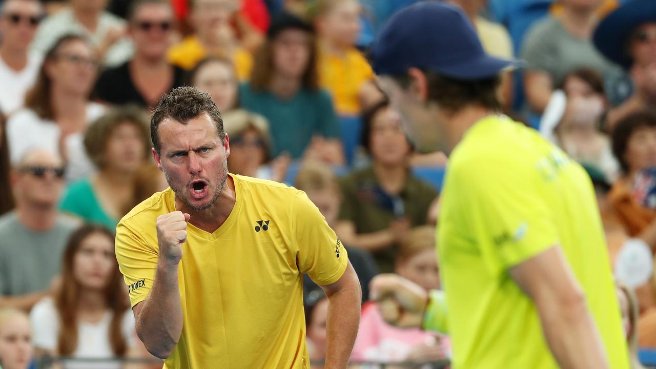 Australian Davis Cup captain Lleyton Hewitt encourages Alex de Minaur during his gutsy victory over Hungary’s Marton Fucsovics. Picture: Getty Images