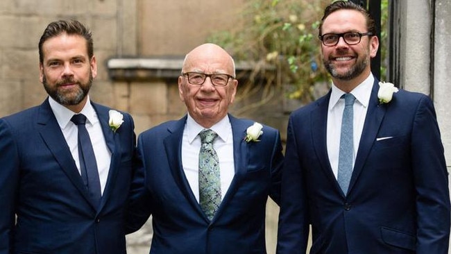 Rupert Murdoch is flanked by his sons Lachlan and James. PHOTO: LEON NEAL/AGENCE FRANCE-PRESSE/GETTY IMAGES