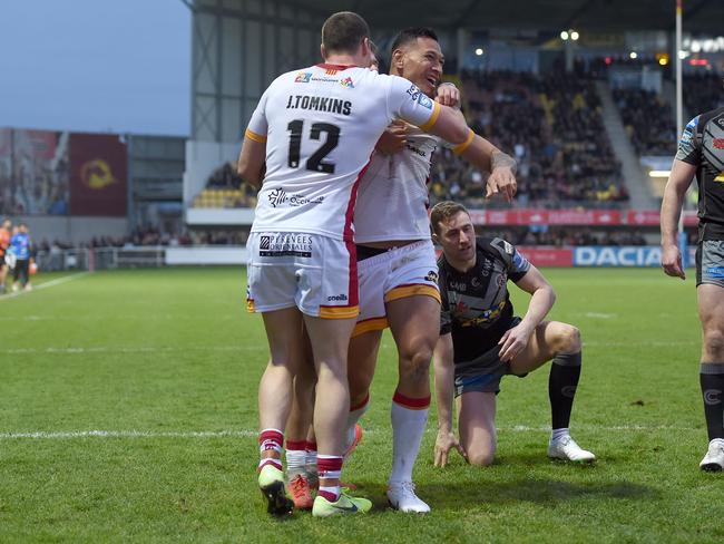 Folau celebrates scoring a try in his comeback. Picture: Getty