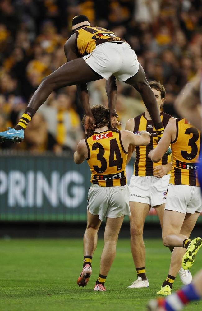 Mabior Chol jumps over Nick Watson during the third term. Picture: Michael Klein