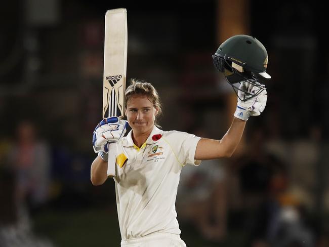 Australia's Ellyse Perry celebrates after she thought she had hit a six to bring up 200.