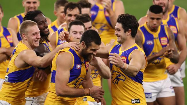 West Coast’s Josh Kennedy is congratulated by teammates after being announced best on ground against Fremantle at Optus Stadium. Picture: Getty Images