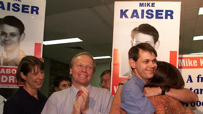 Mike Kaiser hugs wife Maree after claiming victory in the Woodridge by-election in 2000, while Premier Peter Beattie and his wife Heather look on. Picture: Anthony Weate.