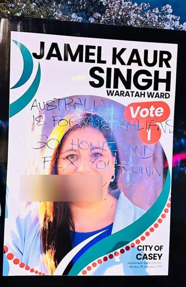 Casey council candidate Jamel Kaur Singh campaign board has been defaced with racist comments. Picture: Supplied