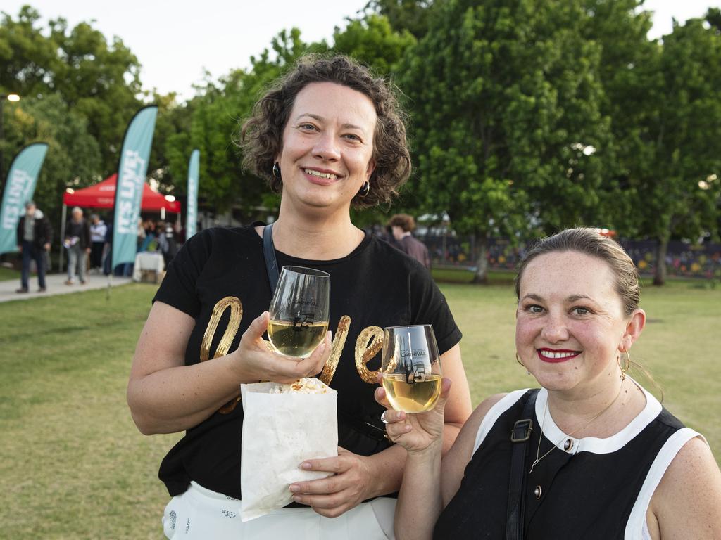 Maida Kopic (left) and Beth Bickford at Symphony Under the Stars concert performed by the Queensland Symphony Orchestra in Queens Park Amphitheatre for Carnival of Flowers, Friday, October 4, 2024. Picture: Kevin Farmer