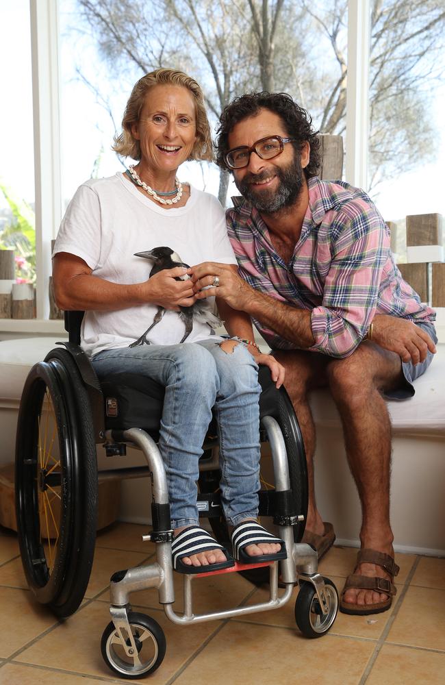 Sam and Cam Bloom pictured at their Northern Beaches home with a Magpie called Van. The inspirational couple and their story has been made into a movie called Penguin Bloom staring Naomi Watts. Picture: David Swift.