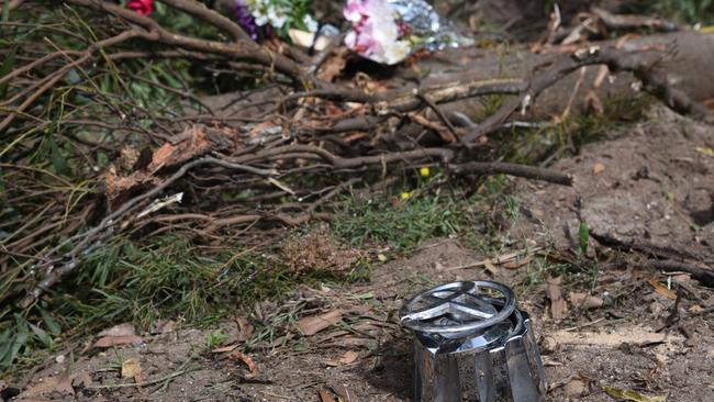 Floral tributes and vehicle detritus at the scene of the double fatal rollover at Somerset, March 11, 2022. Picture: Alex Treacy