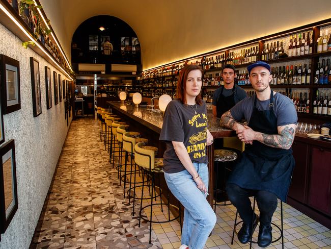 Leigh St Wine Room owners Jake Kellie (Centre),  Nathan and Sali Sasi have just been told they can't serve people at their "bar", even though it's a non-service bar. September 3, 2020. Picture Matt Turner.