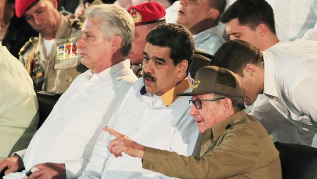 Cuba's former president Raul Castro, right, Venezuela's President Nicolas Maduro and Cuba's President Miguel Diaz-Canel attend the closing ceremony of the Bolivarian Alliance for the Peoples of Our America (ALBA) summit in Havana at the weekend. Picture: AP