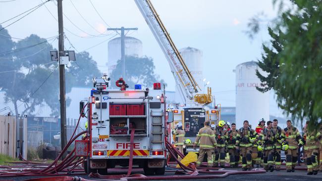 Firefighting crew and emergency response personal attend a factory fire in Sunshine. Picture: Brendan Beckett