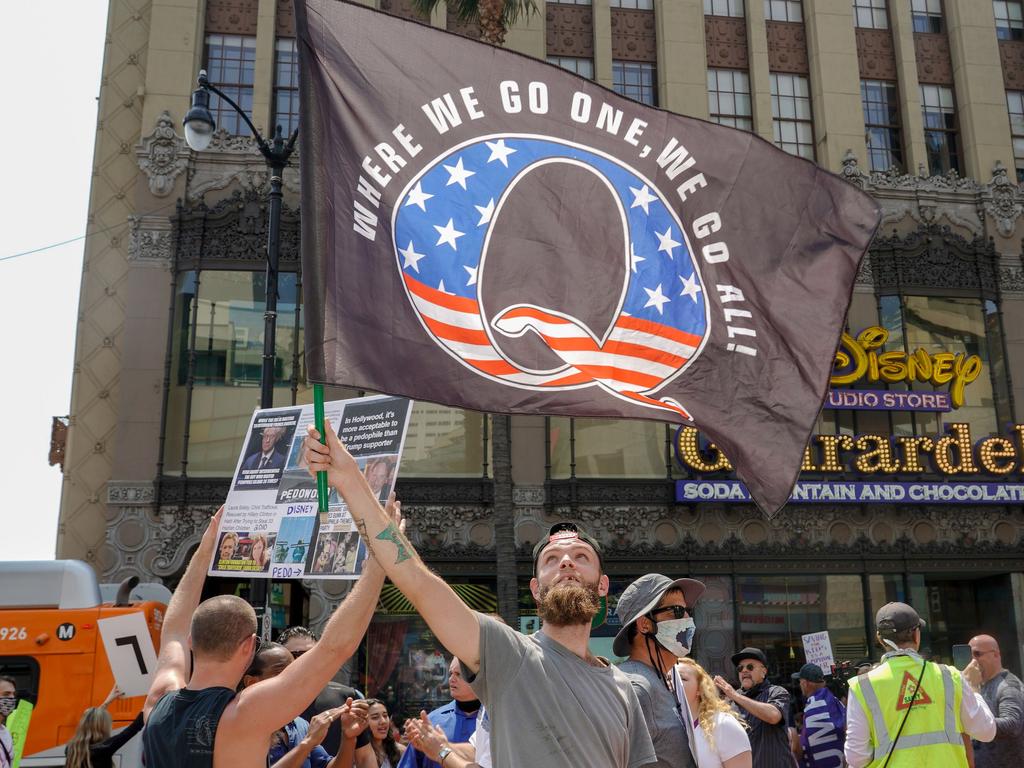 QAnon demonstrators are seen on Hollywood Boulevard in Los Angeles, California. Picture: AFP