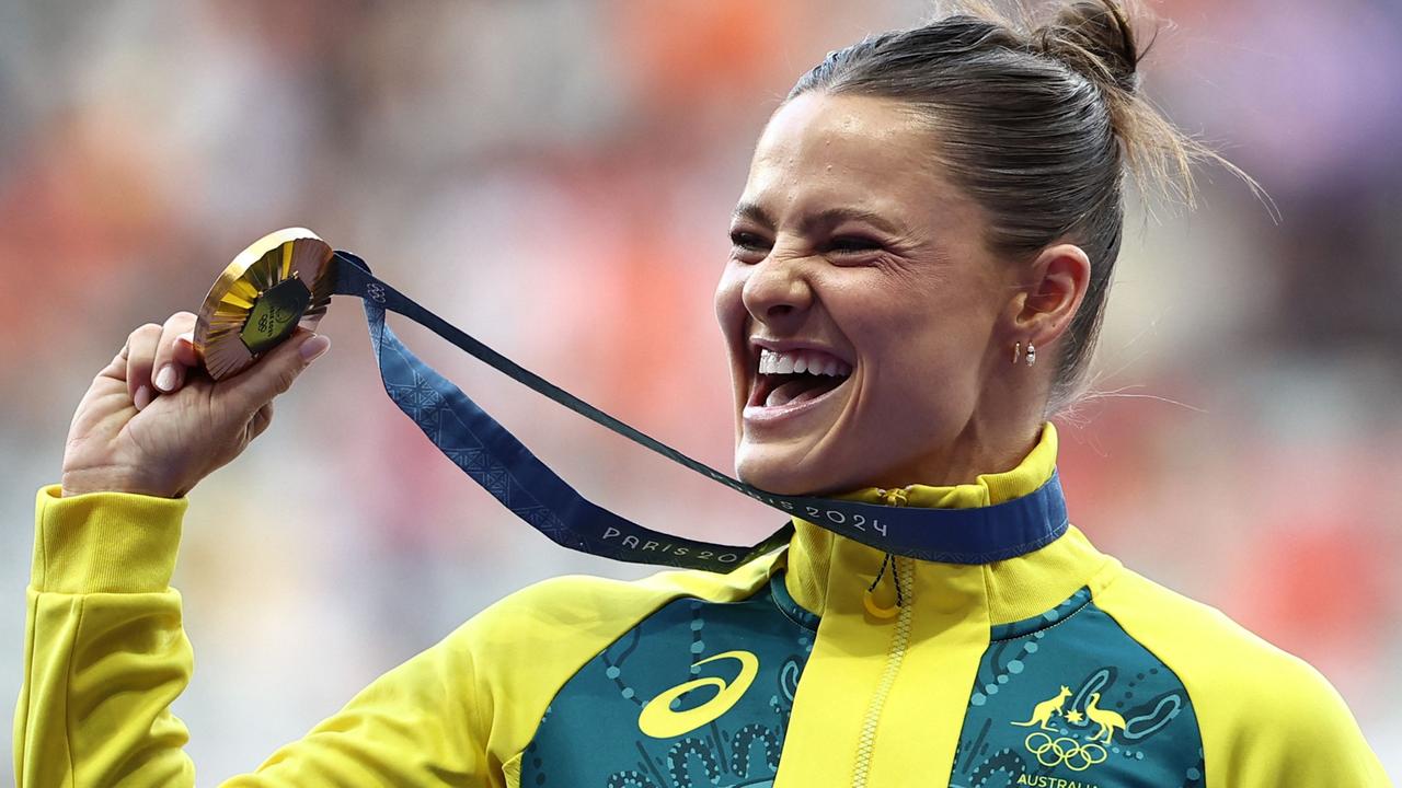 Gold medallist Nina Kennedy. Photo by Anne-Christine POUJOULAT / AFP