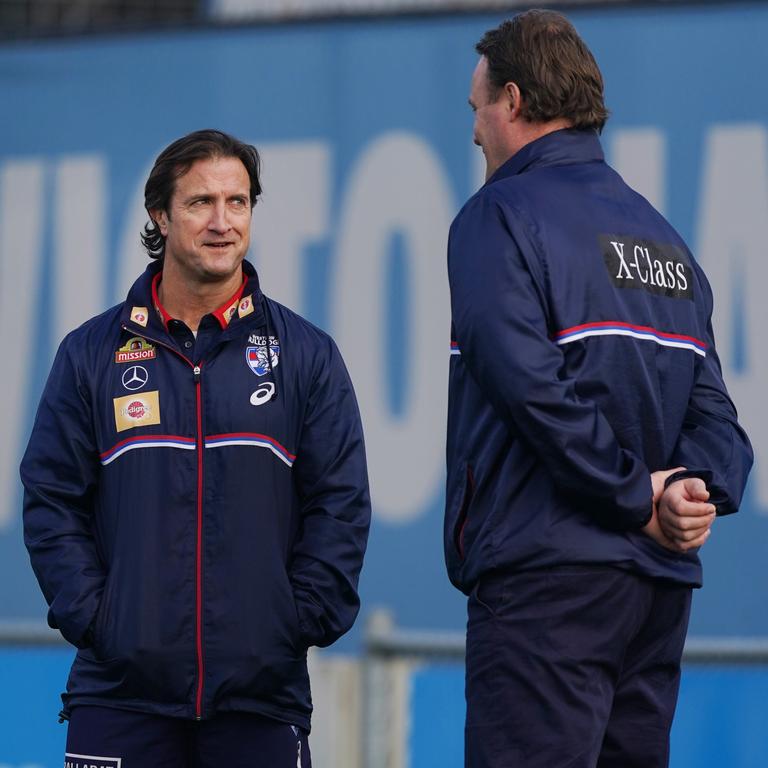 Western Bulldogs coach Luke Beveridge and director of football Chris Grant (right) are not at odds despite some football department ‘tension’ over the off-season, according to Bulldogs boss Ameet Bains. Picture: Michael Dodge / AAP