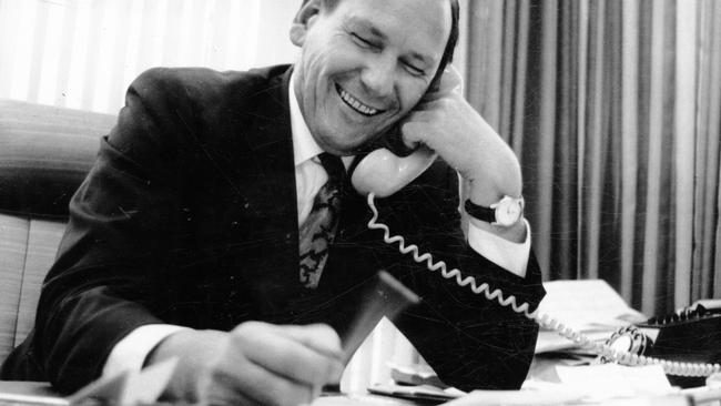 Adelaide sharebroker Norman Shierlaw of Poseidon NL nickel mining company, giving interview in his office, Jun 1970. (Pic by unidentified staff photographer)
