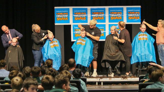 St Brendan's College students Guy Gibson, Cruz Leahy, Rylan Schmidt, Jasper Jansen and Riley Eyles taking part in Shave for a Cure, which raised almost $16,000.