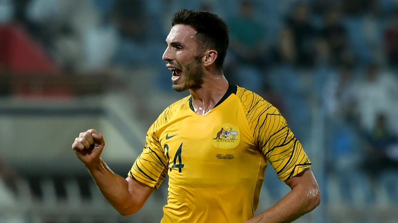 Apostolos Giannou celebrates scoring the opening goal, his first international strike for Australia.