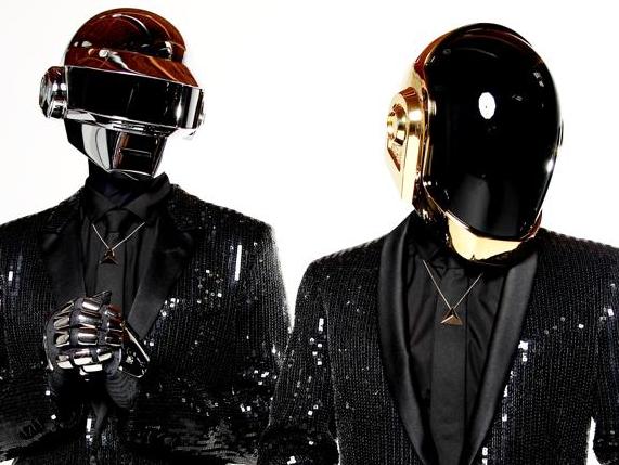 FILE - In this April 17, 2013 file photo, Thomas Bangalter, left, and Guy-Manuel de Homem-Christo, from the music group, Daft Punk, pose for a portrait in Los Angeles. Daft Punk has five nominations at Sunday, Jan. 26, 2014 Grammy Awards, including album of the year for “Random Access Memories” and record of the year for “Get Lucky.” (Photo by Matt Sayles/Invision/AP, File)