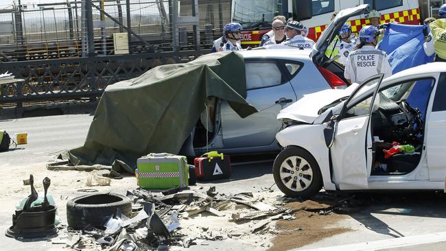 SYDNEY, AUSTRALIA - NewsWire Photos OCTOBER 17 , 2024:  Emergency services on the scene of a multi vehicle crash on the south end of the Sydney Harbour Bridge which resulted in at least one death and  closed the bridge to traffic in both directions. Accident occured around 1.40pmPicture: NewsWire / John Appleyard