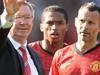  WEST BROMWICH, ENGLAND - MAY 19: Manchester United manager Sir Alex Ferguson is applauded by players Rio Ferdinand and Ryan ...