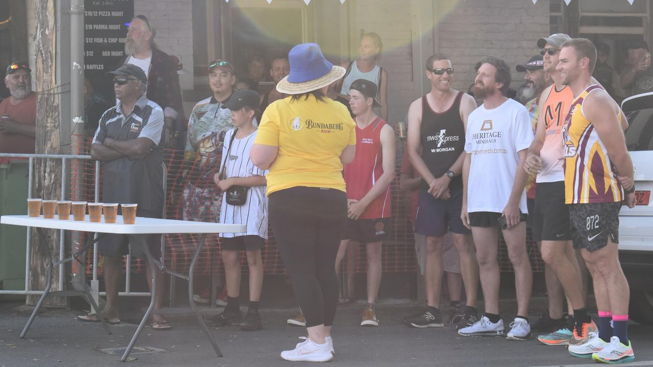 Runners lined up at The Grand ready to run to the Railway Hotel.