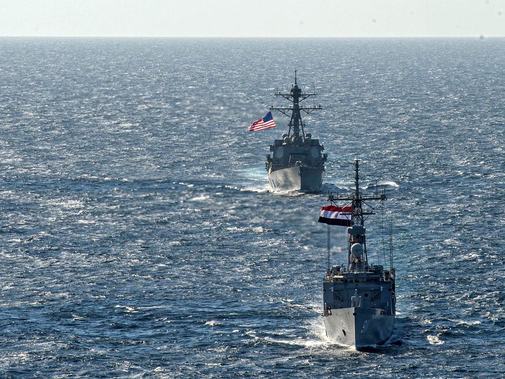 US Navy guided-missile destroyer USS Jason Dunham, rear. Picture: Theoplis Stewart II/US Navy/AFP
