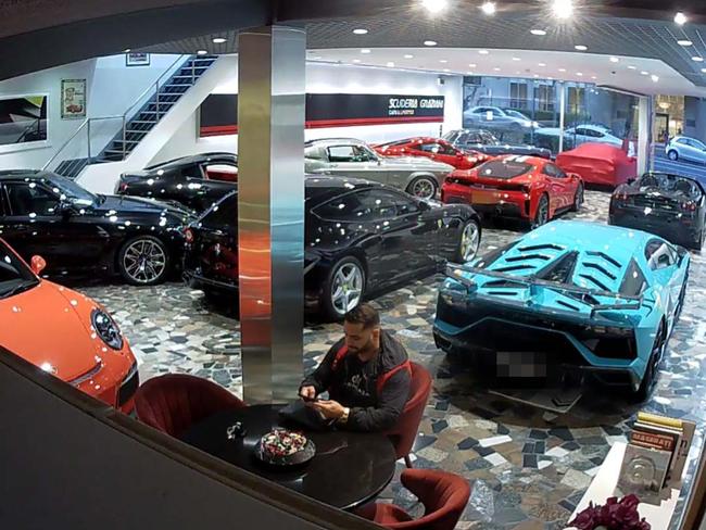 Mostafa Baluch inside a luxury car dealership on May, 2021.