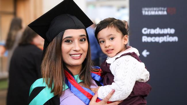 Bachelor of Nursing graduate Sudha Koirala with niece Aanya Adhikari at the University of Tasmania 2024 Winter Graduations ceremony in Launceston. Picture: Stephanie Dalton