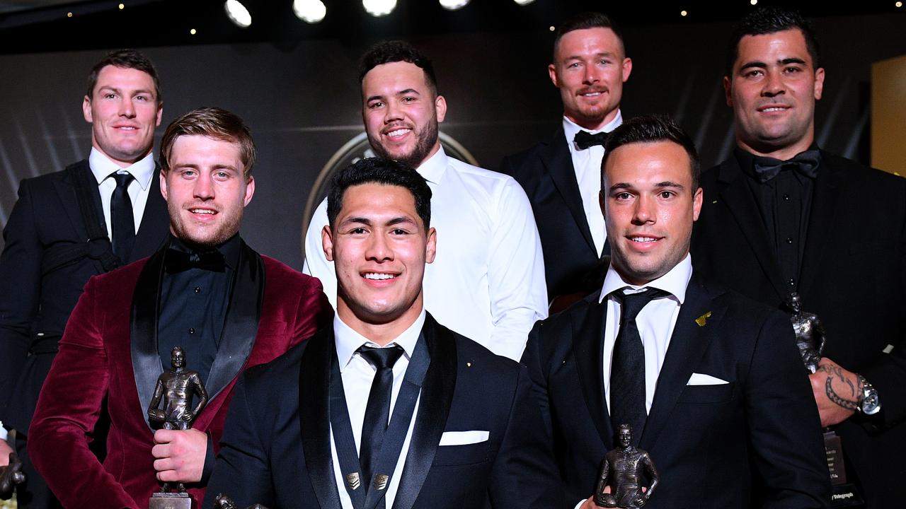 2018 Dally M Award winner Roger Tuivasa-Sheck (centre) with the rest of the team of the year.