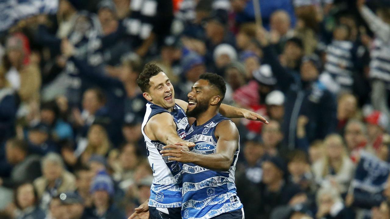 Luke Dahlhaus and Esava Ratugolea celebrate a goal at GMHBA Stadium.