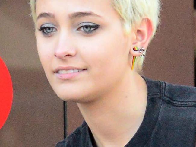 Paris Jackson shows what a futre Billionaire does in her spare time as she grabs a Sprinkles Cupcake with her bodyguard and a tattooed friend in Beverly Hills, Ca it was recently announced that her father Michael Jacksons estate has sold the music catalog for 750 million which will make her and her siblings billionaires by the time they are 30 Pictured: Paris Jackson Ref: SPL1246907 150316 Picture by: London Entertainment /Splash Splash News and Pictures Los Angeles: 310-821-2666 New York: 212-619-2666 London: 870-934-2666 photodesk@splashnews.com