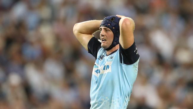 Dean Mumm of the Waratahs looks dejected at Allianz Stadium.