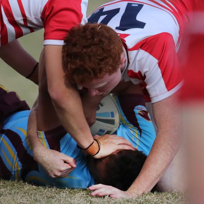 Keebra Park host Palm Beach Currumbin at Owen Park in the Langer Cup.PBCs Ezra Ubaldino and Oscar Bryant give Keebra's Connor Te Kani the treatment. Picture Glenn Hampson