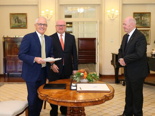 The Governor-General, Sir Peter Cosgrove receiving the Prime Minister Malcolm Turnbull and Attorney-General, Senator the George Brandis for the assent of the Marriage Amendment (Definition and Religious Freedoms) Bill 2017, at Government House in Canberra. Picture: Kym Smith