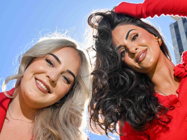 ADELAIDE, AUSTRALIA - NewsWire Photos MARCH 13, 2025: Young entrepreneurs Nicole Tomasek, left, and Nicola Nikolaidis. They're best friends and they've started a business creating a hair product called Nikol which combines sun protection and beauty. Picture: NewsWire / Brenton Edwards