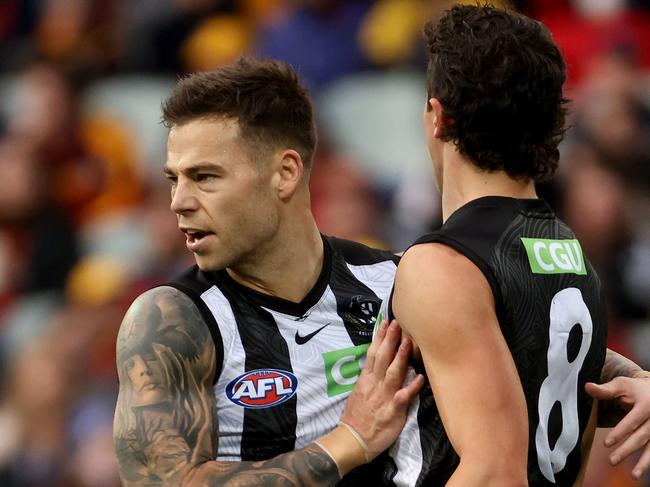 ADELAIDE, AUSTRALIA - JUNE 05: Jamie Elliott and Trent Bianco of the Magpies celebrate a goal during the 2021 AFL Round 12 match between the Adelaide Crows and the Collingwood Magpies at Adelaide Oval on June 5, 2021 in Adelaide, Australia. (Photo by James Elsby/AFL Photos via Getty Images)