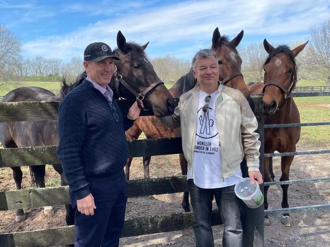 American racehorse owner John Stewart (right) and Inglis managing director Mark Webster with Stewart's $US6m purchase – the Group 1-winning sprinter Goodnight Olive – at Resolute Farm in Kentucky, US. Picture: Supplied