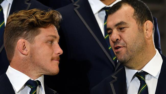 Wallabies coach Michael Cheika (right) with captain Michael Hooper at Friday’s World Cup squad announcement. Picture: AFP