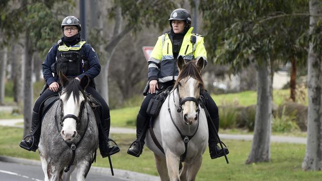 Mounted police patrol Burnside Heights after a man was shot dead. Picture: Andrew Henshaw