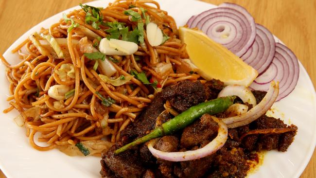 Chicken noodles with goat fry at AD’s Kitchen in Campsie shows the Chinese and Indian influence on Nepalese cuisine. Picture: Jonathan Ng