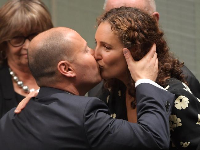 Treasurer Josh Frydenberg kisses his wife Amie Frydenberg after delivering the Budget in the House of Representatives. Picture: Getty Images