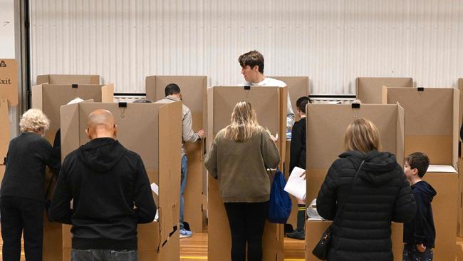 Residents cast their vote in the federal election in Cook electorate. Picture: SAEED KHAN / AFP