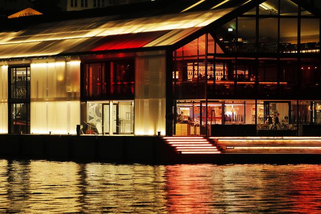 The Glass House at Brooke Street Pier painting the town red for Dark Mofo. Picture: MATHEW FARRELL