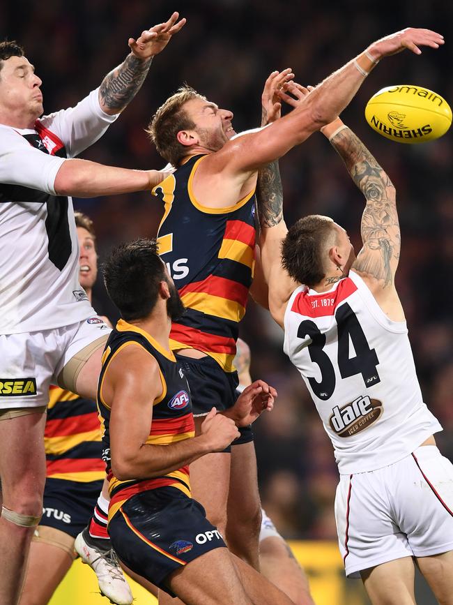 Daniel Talia spoils Saints forward Matt Parker on Saturday night. Picture: Mark Brake/Getty Images